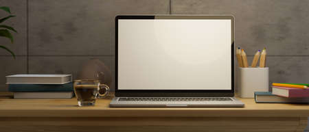 Close-up of working space with laptop computer blank screen mockup, coffee cup and stationery on wooden table over cement wall. 3d rendering, 3d illustrationの写真素材
