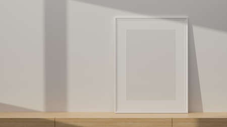 White portrait poster frame mockup standing on wooden table with copy space over white wall. 3d rendering, 3d illustrationの写真素材