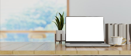 Close-up Laptop computer empty screen mockup with simple decor and copy space on wooden table. 3d rendering, 3d illustrationの写真素材