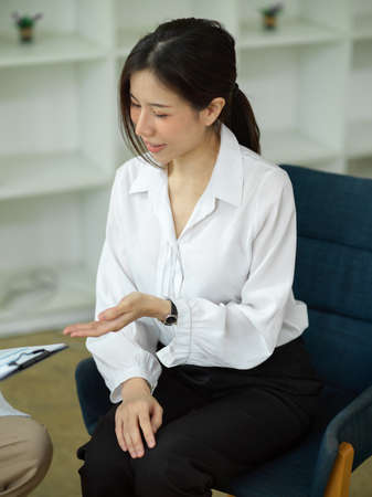 Portrait of Successful executive female discussing and meeting with her assistant in modern meeting room.の写真素材
