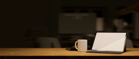 Modern dark office concept, Tablet touchscreen mockup on wooden table with copy space under low light. 3d rendering, 3d illustrationの写真素材