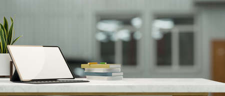 Close-up, digital touchpad blank screen mockup with empty space for montage on tabletop over blurred office room background. 3d rendering, 3d illustrationの写真素材
