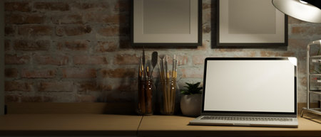 Laptop computer mockup under low light from table lamp on a wooden desk. frame mockup the brick wall. 3d rendering, 3d illustrationの写真素材