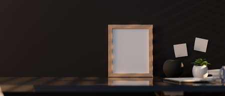 A wooden frame mockup on table with copy space and decor over black wallpaper. 3d rendering, 3d illustrationの写真素材
