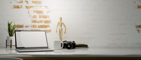 Close-up, A minimal workspace with laptop computer blank screen mockup, accessories and copy space for product display over white brick wall. 3d rendering, 3d illustrationの写真素材