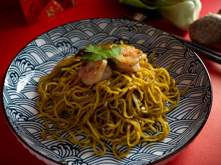 Chow mein or Chinese stir fried noodles with shrimp, Hakka noodles, Chinese or Malaysian cuisine. close-upの写真素材