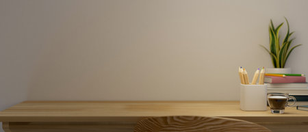 Comfortable wooden table with stationery, books, decor plant and copy space for montage product display on top table over white background. 3d rendering, 3d illustrationの写真素材