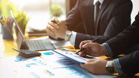 Cropped image of an executive business manager team meeting in the board room, discussing a financial plans.の写真素材