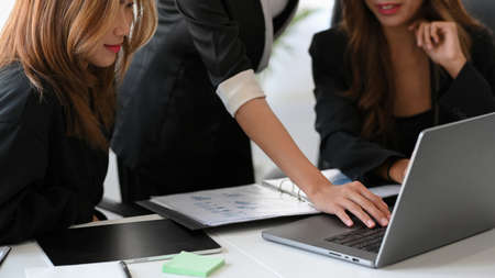 Group of a businesswomen having a project meeting in the office workplace. teamwork concept.の写真素材
