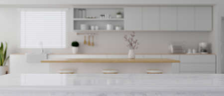 Elegance marble kitchen countertop for product display over blurred modern luxury kitchen space in the background. 3d rendering, 3d illustrationの写真素材
