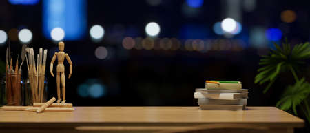 Close-up, Workspace with empty space. Wooden tabletop with copy space for product display over blurred dark background. 3d rendering, 3d illustrationの写真素材