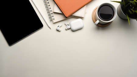 Workspace with digital devices, stationery, stuff and copy space for your text or product display on...