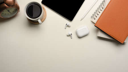 Modern minimal white workspace with office supplies and copy space for product display. top viewの写真素材