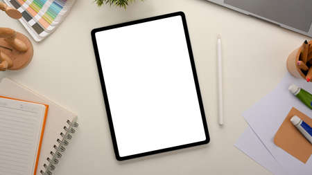 Graphic design student working table concept with digital tablet computer and essential equipments on white background. flat layの写真素材