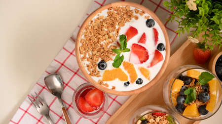 Dietary food, healthy food breakfast concept with Berries yogurt bowl, Fresh fruits yogurt bowl and fresh strawberry.の写真素材