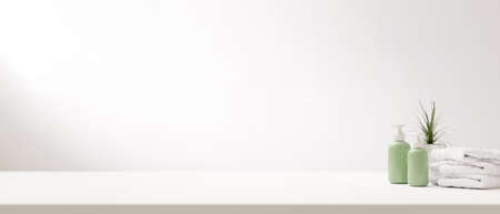 A copy space for display your bathroom products on white tabletop with bathroom accessories over white background. 3d rendering, 3d illustrationの写真素材