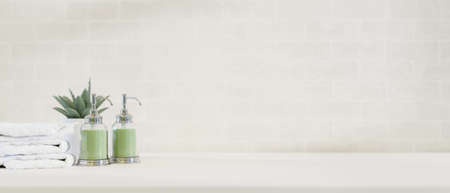 Close-up view of a copy space on white tabletop with bathroom accessories over white wall background. 3d rendering, 3d illustrationの写真素材