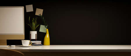 Modern dark workspace with desktop computer mockup, offie supplies and copy space on table over black wallpaper. close-up view, 3d rendering, 3d illustrationの写真素材