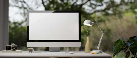 Modern contemporary office workspace with pc desktop computer mockup and supplies on table over...