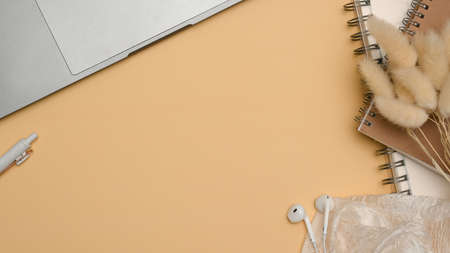 Minimal beige office table background with office supplies and copy space for product display. top view, flat layの写真素材