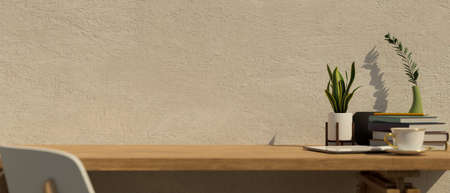 Modern workspace, A wooden tabletop with stack of books, decor plants, coffee cup and copy space for montage over cement loft wall. close-up. 3d rendering, 3d illustrationの写真素材