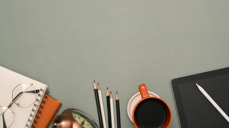 Modern study table or office desk background with copy space for product display, stationery and accessories on grey background. top view, flat layの写真素材