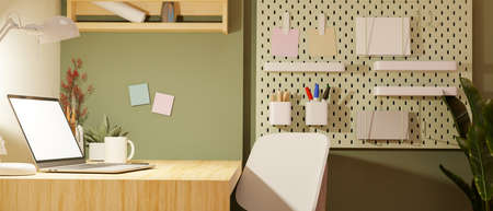 Modern minimal workspace in college dorm apartment with portable laptop computer mockup, stationery...