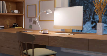 Comfortable and cozy home working room interior with computer mockup, table lamp and decor on wooden...