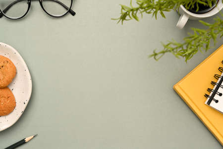 Overhead view, Stylish modern workspace office desk with mockup space on grey background and office...
