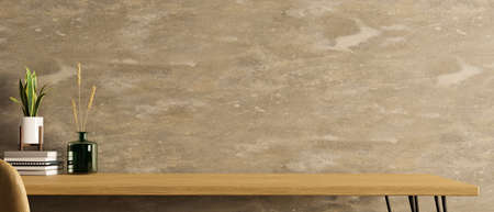 Wooden tabletop with plant in pot, aroma diffuser, stack of books and copy space for product display against modern loft wall. 3d rendering, 3d illustrationの写真素材