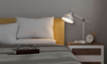 Eyeglasses and book on a comfortable bed in minimal comfortable bedroom interior design. Bedroom background. 3d rendering, 3d illustrationの写真素材