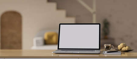 Modern wood work tabletop with portable laptop computer mockup, breakfast set, book, pen and copy...