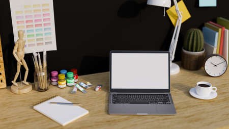 Teens study table workspace with portable laptop computer blank screen mockup, painting tools, stationery, acrylic colour and decor over black wall. 3d rendering, 3d illustrationの写真素材