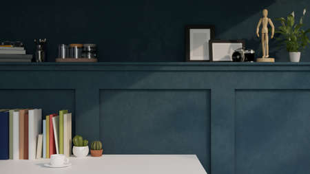 Copy space on white table with stack of book and decor against the stylish blue wall with home accessories. 3d rendering, 3d illustrationの写真素材