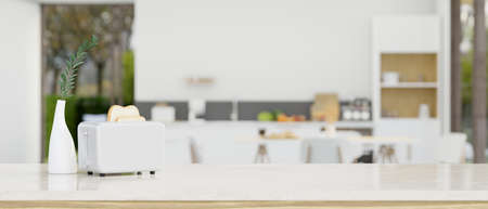 Modern white tabletop or countertop with white ceramic vase, toaster and mockup space for montage your product display over blurred white elegance kitchen background. 3d rendering, 3d illustrationの写真素材