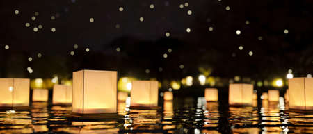 A group of lantern floating on the lake at night. Loy Krathong Festival, Chinese paper floating...