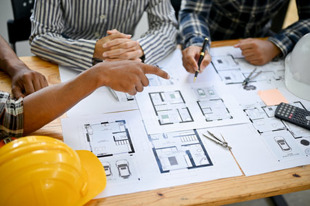 Team of professional Asian architects and engineer are working together in the office, planning and...