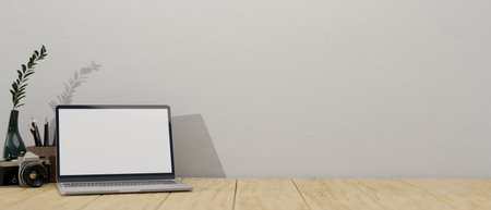 close-up image, Minimal workspace with laptop white screen mockup, camera, vase, stationery and copy...