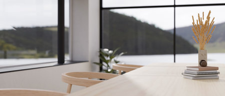 Close-up image, Minimal wood meeting table or dining table with books, flower vase and copy space...
