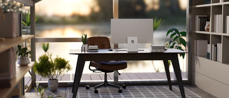 Modern contemporary home office or private office interior with pc computer and decor on table in...