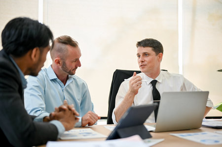 Smart and successful Caucasian male CEO or executive manager in white shirt with tie is in the...