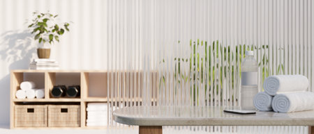 Copy space for product display on tabletop with roll of towels, smartphone and a bottle of water in...