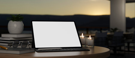 Close-up image of a digital tablet white screen mockup, eyeglasses, candles and accessories on a table over blurred dark background. 3d render, 3d illustrationの写真素材