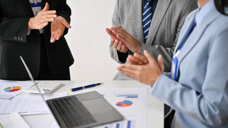 Close-up image, Businesspeople are applauding in the meeting to celebrate their successful project....