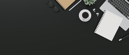 Top view of a modern office desk with notepad, coffee cup, eyeglasses, laptop, stationery, earbuds,...