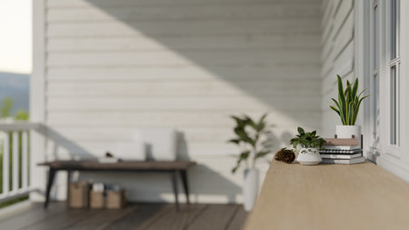 Close-up rear view image of a copy space on a wooden tabletop with decor at a home patio or balcony. 3d render, 3d illustrationの写真素材