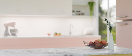 Close-up image of a luxury white marble kitchen tabletop with apple tray, a vase, and copy space for your product display over blurred beautiful pink kitchen as background. 3d render, 3d illustrationの写真素材