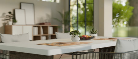 Close-up image of a luxury dining table with beautiful table setting in a modern contemporary home...