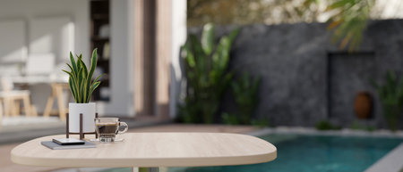 Close-up image of copy space on a wooden table with a coffee cup, potted plant, and decor over a blurred, beautiful swimming pool in the background. 3d render, 3d illustrationの写真素材