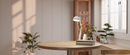 Close-up image of a copy space on a wooden table with a table lamp, books, and a flower vase in a modern and minimalist room. 3d render, 3d illustrationの写真素材